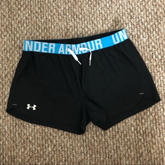 Under Armour Pants - Black Under Armour shorts with light blue band.